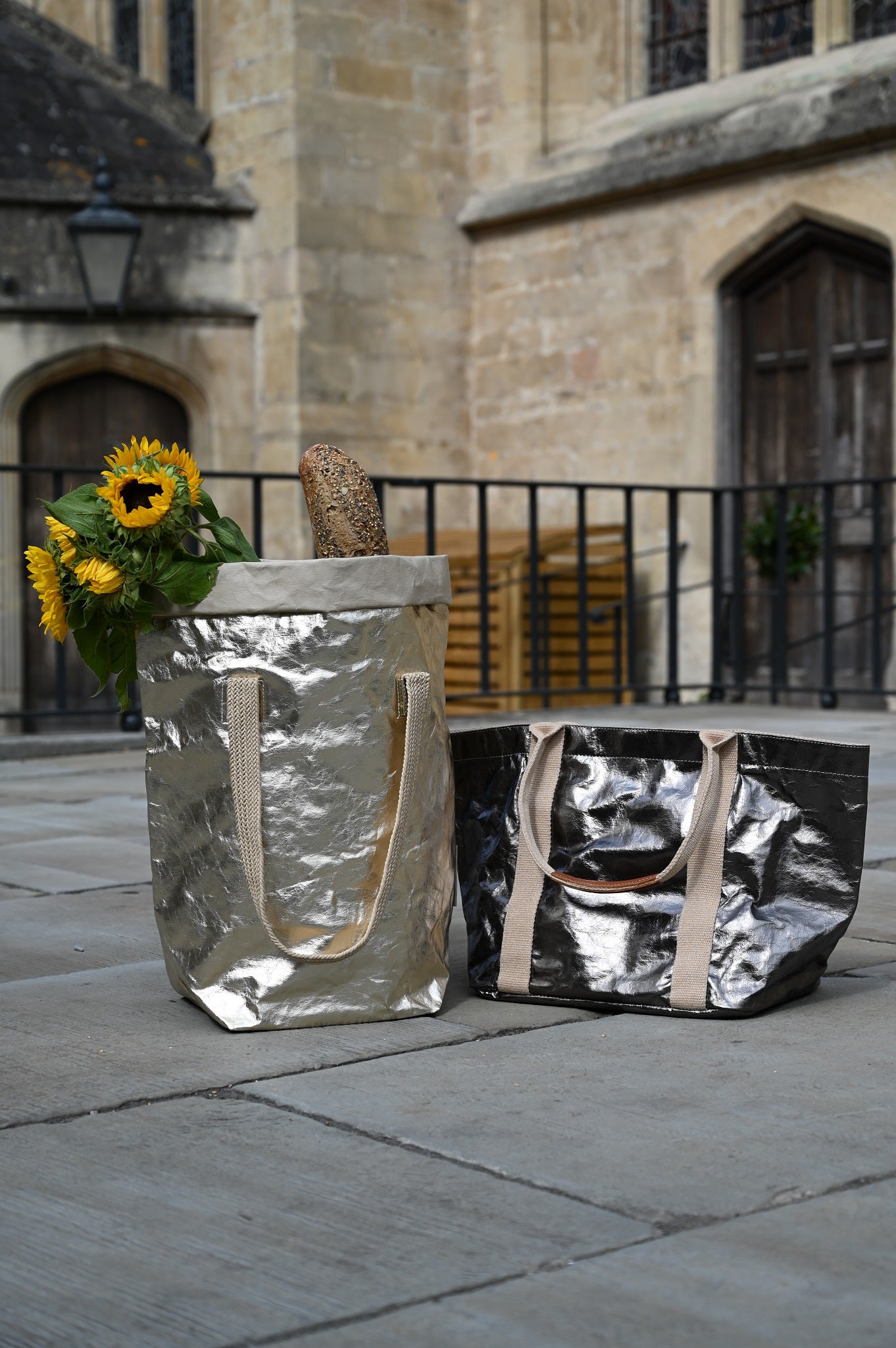 pale gold carry all two strap and the small gunmetel tote bag