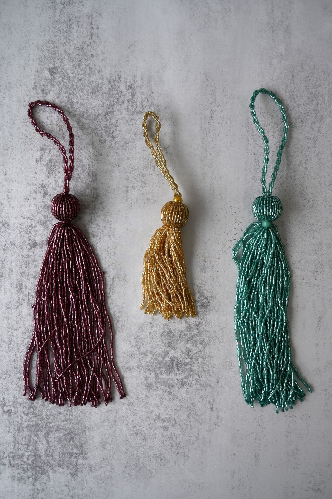 Türkisfarbene Perlenquastendekoration