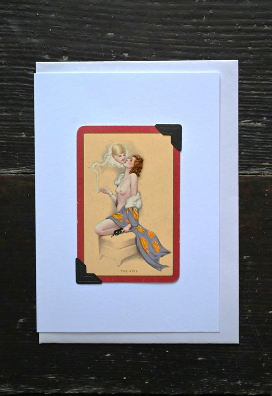 Vintage-style card with a stylized illustration of a woman on a dark surface