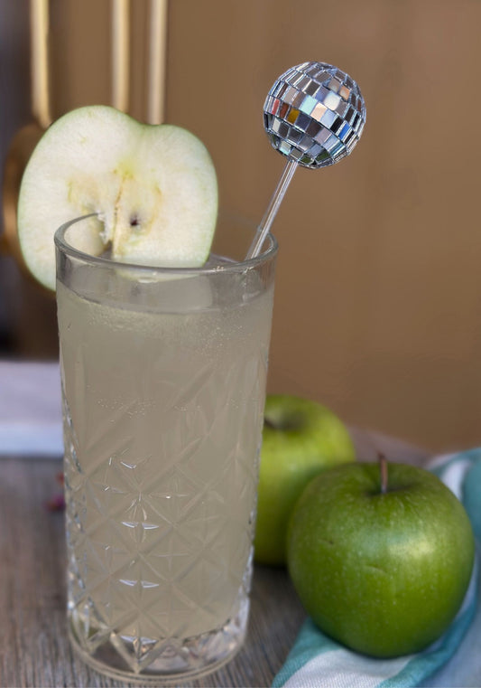 Set mit vier Getränkerührern in Form von Diskokugeln