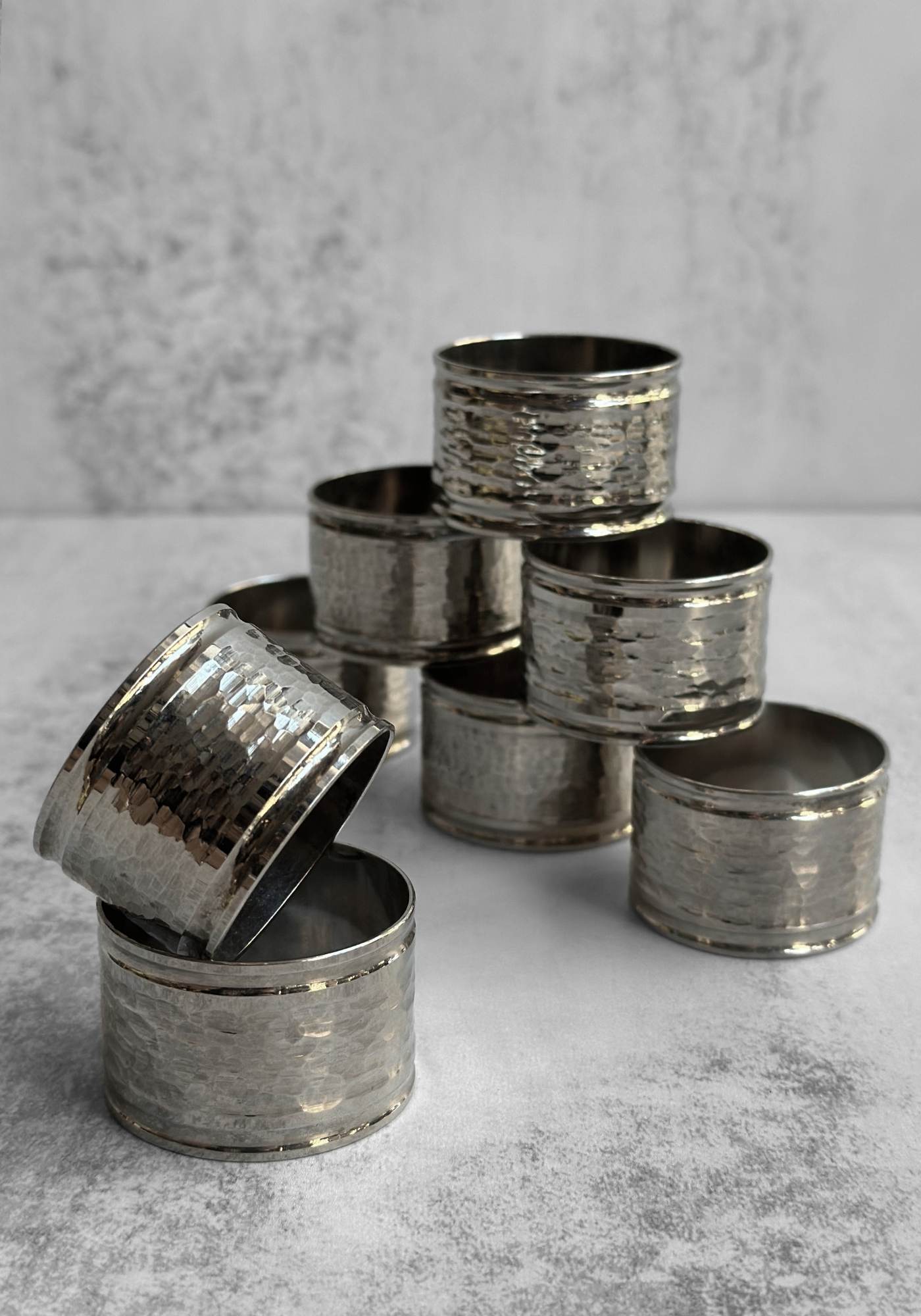 Set of Nine Hammered Silver Napkin Rings