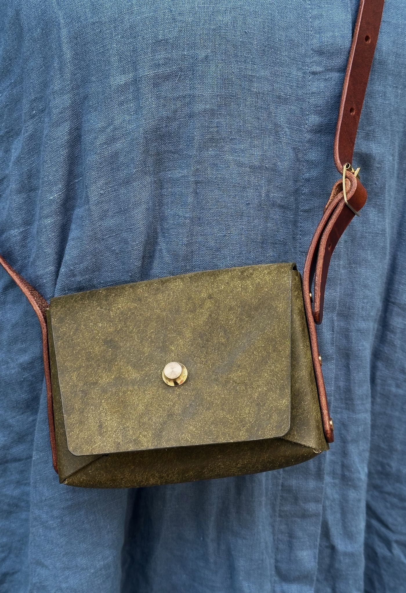 green and brown leather pedro bag