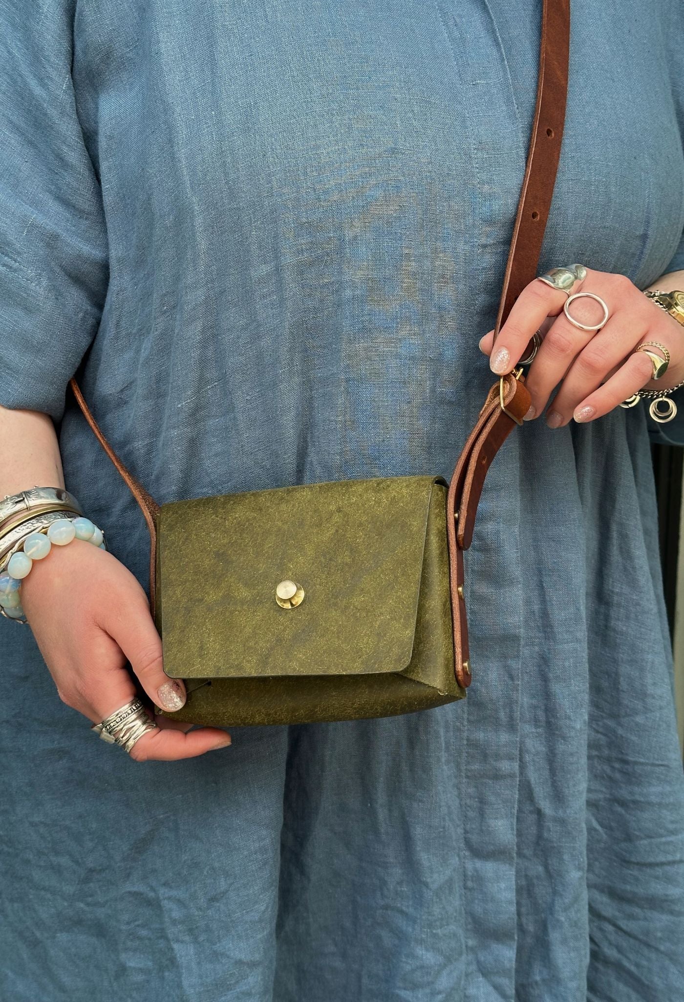 green and brown leather pedro bag