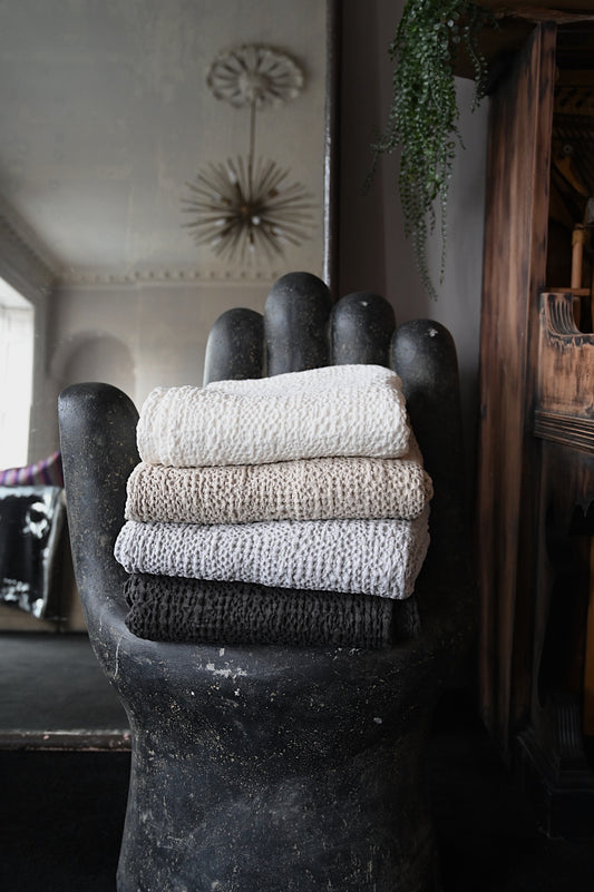 White, beige, grey and back Throws