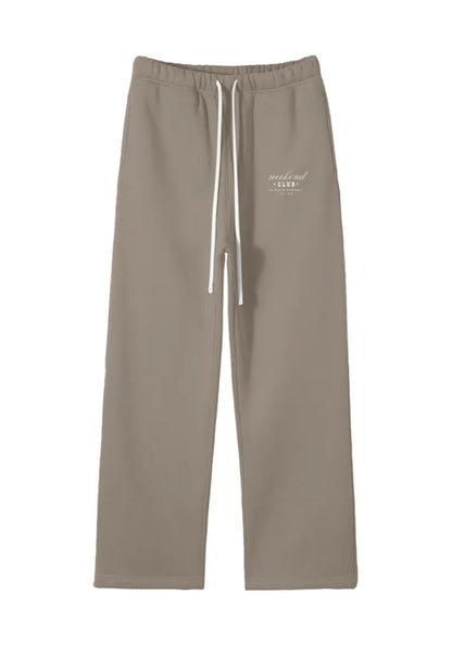 Beige sweatpants with a brand logo on a white background