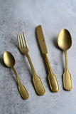 Set of Four Vintage Gold Cutlery
