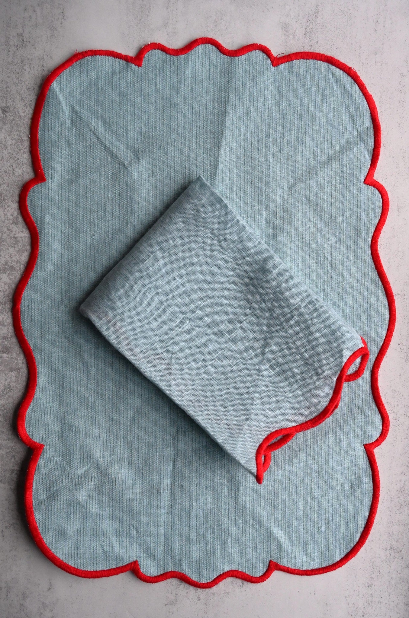 Sky Blue Scalloped Napkin with Red Border