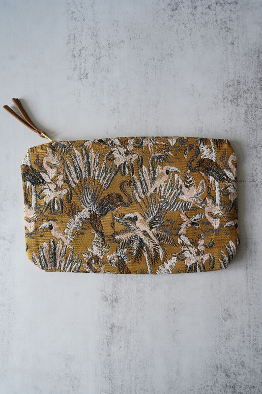 Ochre tapestry pouch with a tropical flamingo and toucan jungle print and top zipper.