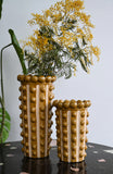 Vases à pompons moutarde 