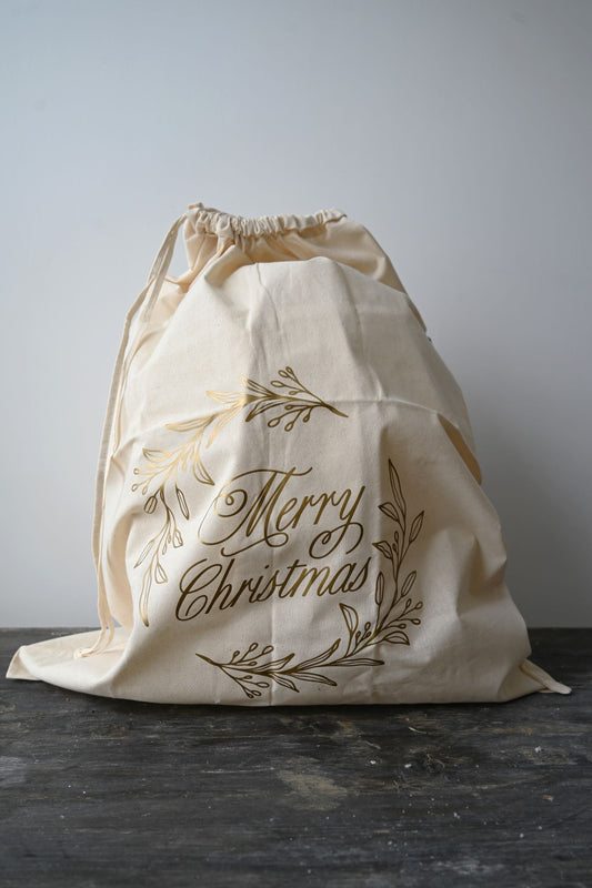Mattgoldener Weihnachtssack „Frohe Weihnachten“ 