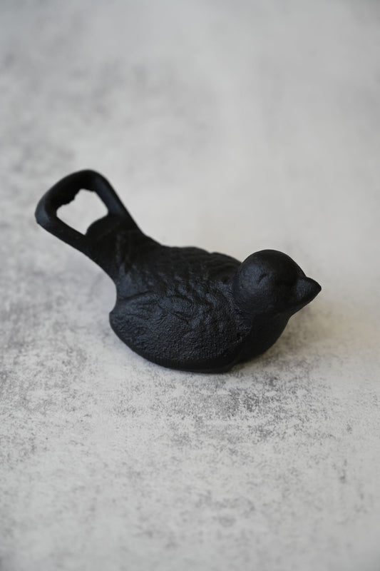 Flaschenöffner aus Gusseisen mit Vogelmotiv 