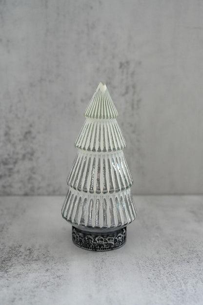 Decorative glass tree with textured design on a gray background
