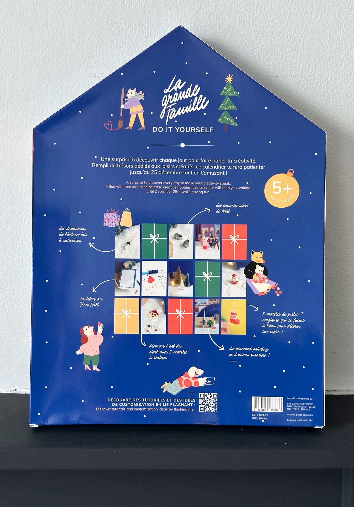 Blue packaging with illustrations and text on a white background