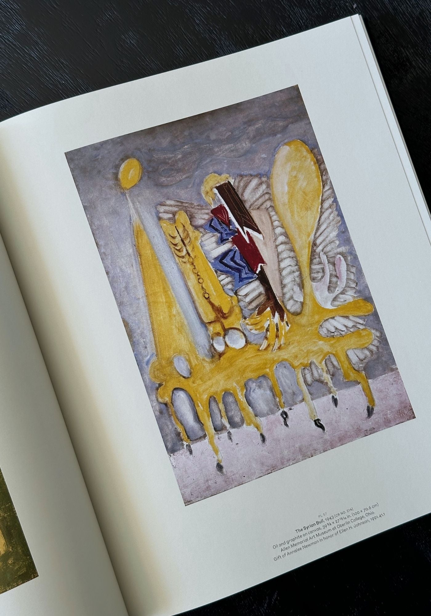 Illustration of a character in a chair with a yellow background on a book page.