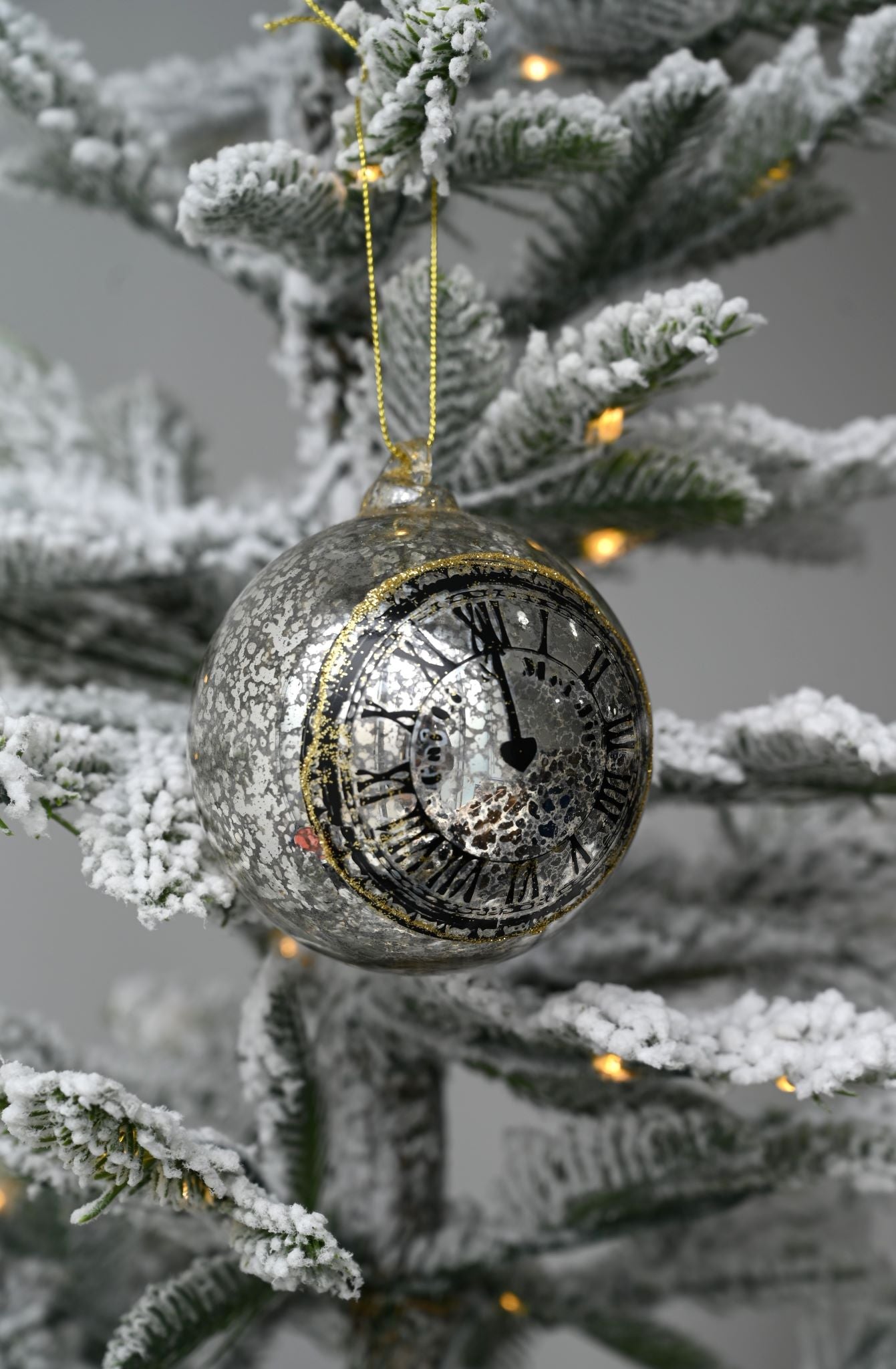 Horloge boule en argent