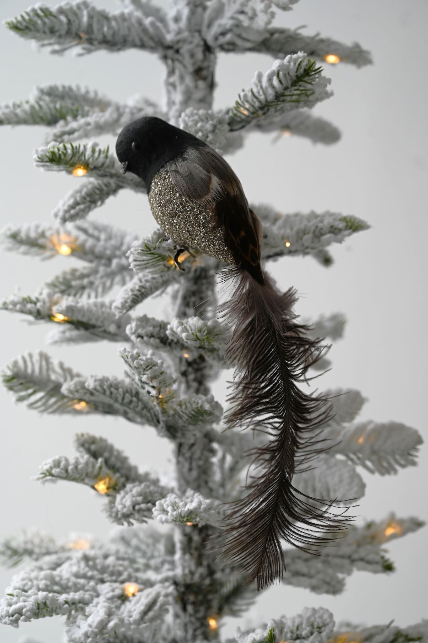Vogeldekoration mit Glitzer in Schwarz und Silber 