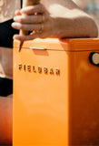 Close-up of luxury Fieldbar Drinks Cooler Box in Orchard Orange