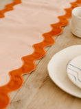 orange scallop edge table runner